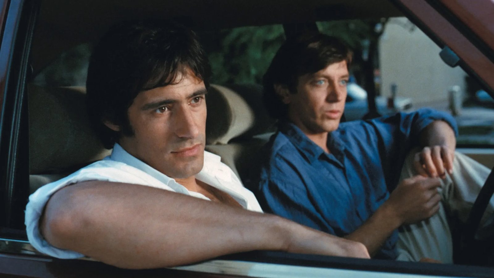 Gérard Lanvin et Bernard Giraudeau dans une voiture dans le film Les Spécialistes